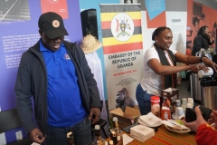 Patrick Igella (left) and Jesca Magaba represent the Republic of Uganda. (AFRO Photo / Patricia McDougall)