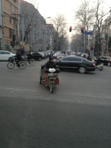 Cars and Bikes Share the Roads in China. (Photo by Ann Ragland/NNPA) 
