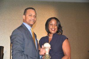 NNPA Chairman Cloves Campbell presents NAACP Board Chair Roslyn Brock with with Leadership Award (NNPA Photo by Ann Ragland)