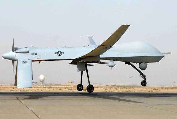 This undated US Air Force photo shows an MQ-1 Predator unmanned aircraft as it prepares for takeoff in support of operations in Southwest Asia. Iranian fighter jets fired on an unarmed US drone in the Gulf last week and missed, the Pentagon said November 8, 2012, warning that the United States stood ready to protect its forces in the region. "They intercepted the aircraft and fired multiple rounds," spokesman George Little told a news conference. The US military plane was "never in Iranian air space" and came under fire on November 1 from SU-25 fighters off the Iranian coast over international waters, he said. The MQ-1 Predator, a turboprop plane that flies at a much slower speed than the fighter jets, was pursued further by the Iranian warplanes but not fired on again. The Predator later returned safely to an unspecified military base in the region, Little said. The Predator was intercepted about 16 nautical miles off the Iranian coast, beyond Iran's territorial waters that extend 12 nautical miles off the country's shore, he added. = RESTRICTED TO EDITORIAL USE - MANDATORY CREDIT " AFP PHOTO / US AIRFORCE/JULIANNE SHOWALTER/" - NO MARKETING NO ADVERTISING CAMPAIGNS - DISTRIBUTED AS A SERVICE TO CLIENTS = JULIANNE SHOWALTER/AFP/Getty Images ** TCN OUT **