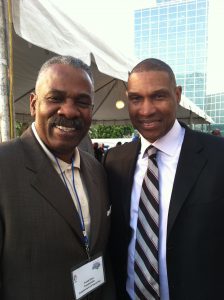 Everett Glenn (left) with Minnesota Vikings Coach Leslie Frazier.