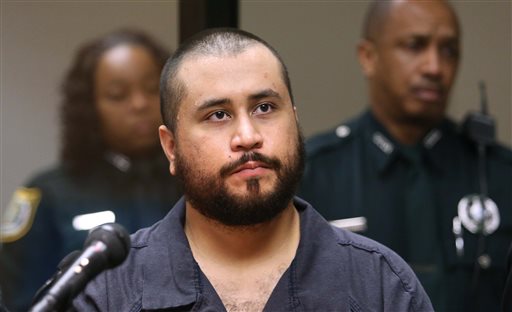 In this Tuesday, Nov. 19,  2013, file photo, George Zimmerman, acquitted in the high-profile killing of unarmed black teenager Trayvon Martin, listens in court, in Sanford, Fla., during his hearing on charges including aggravated assault stemming from a fight with his girlfriend. Zimmerman is asking a judge to change the terms of his bond so he can have contact with his girlfriend. Zimmerman on Monday, Dec. 9, 2013, filed an affidavit from his girlfriend that says she doesnt want him charged with aggravated assault, battery and criminal mischief. (AP Photo/Orlando Sentinel, Joe Burbank, Pool, File)