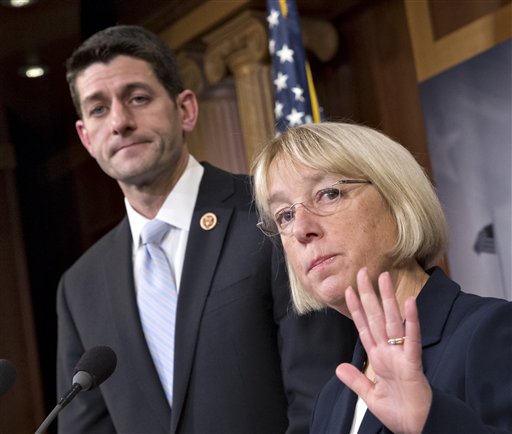 This Dec. 10, 2013 file photo shows House Budget Committee Chairman Rep. Paul Ryan, R-Wis., left, listening as  Senate Budget Committee Chair  Sen.Patty Murray, D-Wash., announce a tentative agreement between Republican and Democratic negotiators on a government spending plan, on Capitol Hill in Washington. Policy trades big and small make up the $1.1 trillion spending deal that Republican and Democratic leaders are rushing through Congress this week to avoid a repeat of Octobers partial government shutdown.   (AP Photo/J. Scott Applewhite)