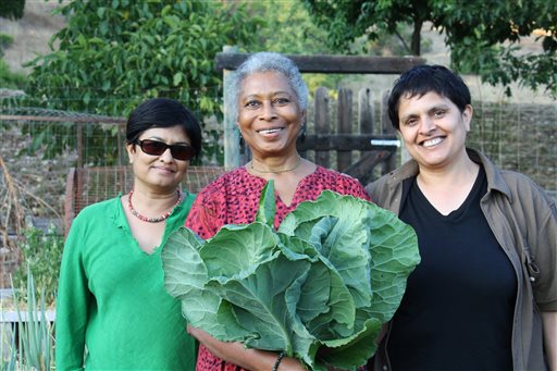 This photo released by PBS shows Alice Walker, center, with director Pratibha Parmar, left, and producer Shaheen Haq of American Masters "Alice Walker: Beauty in Truth," in Northern California. (AP Photo/PBS, Trish Govoni)