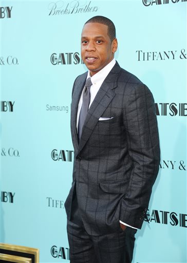 In this May 1, 2013 file photo, Jay-Z attends "The Great Gatsby" world premiere at Avery Fisher Hall in New York. Beyonce and Jay Z share the top spot on Billboards Power 100 list announced on Thursday, Jan. 23, 2014.  (Photo by Evan Agostini/Invision/AP, File)