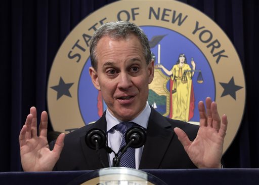 This Nov. 19, 2013 file photo shows New York State Attorney General Eric Schneiderman speaking at a news conference in New York. (AP Photo/Richard Drew, file)