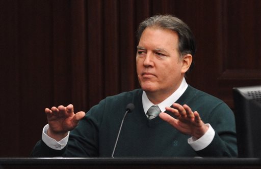 Michael Dunn, takes the stand in his own defense during his trial in Jacksonville, Fla., Tuesday, Feb. 11, 2014. Dunn is charged with fatally shooting 17-year-old Jordan Davis after an argument over loud music outside a Jacksonville, Fla. convenient story in 2012. (The Florida Times-Union, Bob Mack, Pool)