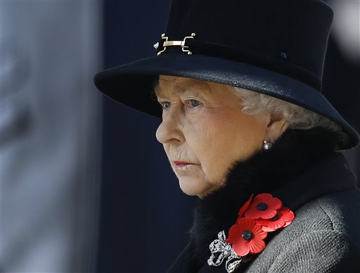 In this Nov. 10, 2013 file photo, Britain's Queen Elizabeth II listens during the service of remembrance at the Cenotaph in Whitehall, London. (AP Photo/Kirsty Wigglesworth, File)