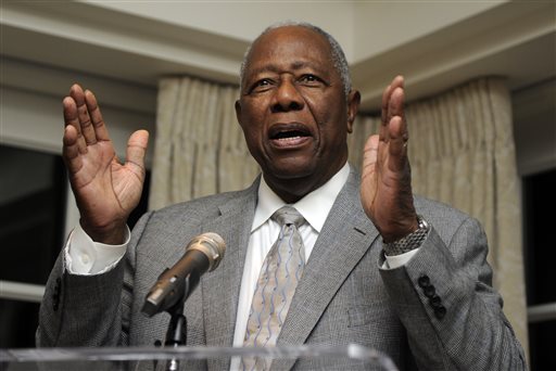 Baseball Hall of Famer Hank Aaron speaks at a reception in his honor, Friday, Feb. 7, 2014, in Washington. Aaron is turning 80 and is being celebrated with a series of events in Washington. (AP Photo/Nick Wass)