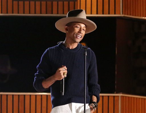 This Jan. 26, 2014 file photo shows Pharrell Williams on stage at the 56th annual Grammy Awards at Staples Center in Los Angeles. (Photo by Matt Sayles/Invision/AP, File)