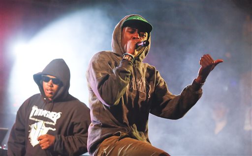 Tyler, The Creator, right, performs during the SXSW Music Festival early Friday, March 14, 2014, in Austin, Texas. (Photo by Jack Plunkett/Invision/AP)