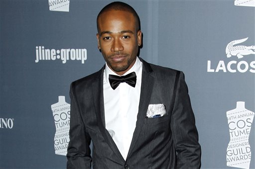 In this Feb. 21, 2012 file photo, actor Columbus Short arrives at the 14th Annual Costume Designers Guild Awards at the The Beverly Hilton hotel in Beverly Hills, Calif. Short was arrested on Wednesday, March 26, 2014, on a felony battery case filed after he knocked a man out in a West Hollywood restaurant during an altercation on March 15, 2014. (AP Photo/Matt Sayles, file)