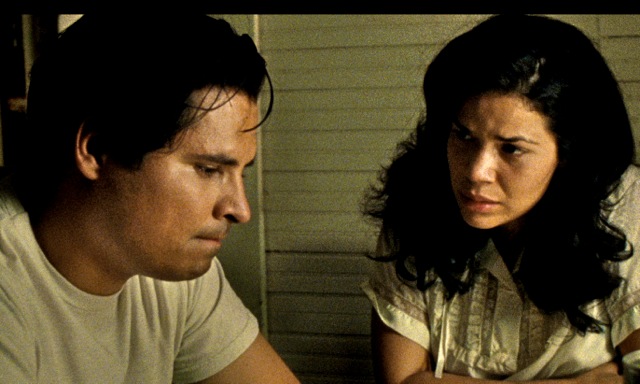 Michael Pena as Chavez with his wife, Helen (America Ferrera)