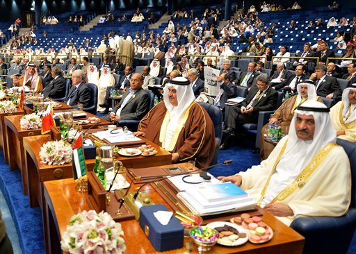 Dignitaries attend the closing session of the Arab League Summit at Bayan Palace, Kuwait on Wednesday, March 26, 2014.(AP Photo/Nasser Waggi)