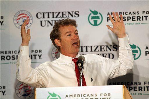 Sen. Rand Paul, R-Ky. speaks at a GOP Freedom Summit, Saturday, April 12, 2014, in Manchester, N.H.  Several potential Republican White House contenders _ among them Kentucky Sen. Rand Paul, Sen. Ted Cruz, and former Arkansas Gov. Mike Huckabee _ headline a conference Saturday in New Hampshire, hosted by the conservative groups Citizens United and Americans for Prosperity. (AP Photo/Jim Cole)