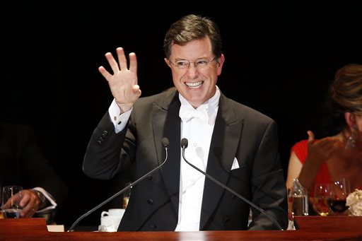 In this Oct. 13, 2013 file photo, Stephen Colbert delivers the keynote address during the Alfred E. Smith Memorial Foundation Dinner, a charity gala organized by the Archdiocese of New York, at the Waldorf-Astoria hotel in New York. (AP Photo/Jason DeCrow, file)