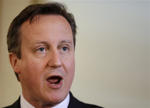 Britain's Prime Minister David Cameron speaks during a press conference with Italian Prime Minister Matteo Renzi at Downing Street in London, Tuesday, April 1, 2014. (AP Photo/Kirsty Wigglesworth, pool)