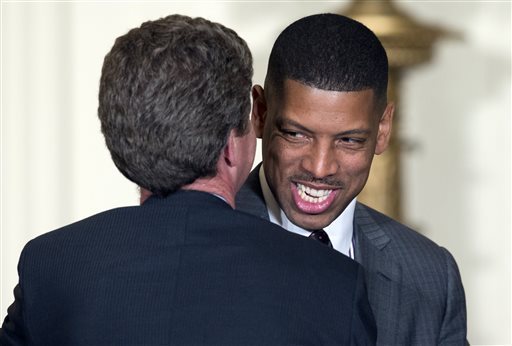In this Jan. 23, 2014 file photo, Housing and Urban Development Secretary Shaun Donovan, left, talks with Sacramento Mayor Kevin Johnson, before President Barack Obama arrives to speak at a reception for the U.S. Conference of Mayors in the East Room of the White House in Washington. (Carolyn Kaster/AP)
