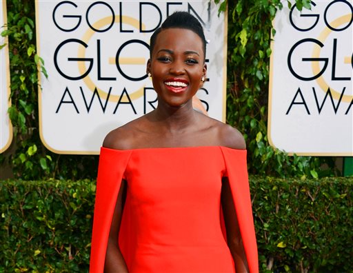 In this Jan. 12, 2014 file photo, Lupita Nyong'o arrives at the 71st annual Golden Globe Awards at the Beverly Hilton Hotel, in Beverly Hills, Calif. The Mexican-born Kenyan will be the first black ambassador for Lancome, which features Julia Roberts, Kate Winslet, Penelope Cruz and Lily Collins as spokeswomen. (Photo by Jordan Strauss/Invision/AP, File)