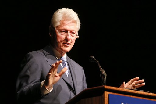 Former President Bill Clinton speaks during the Civil Rights Summit on Wednesday, April 9, 2014, in Austin, Texas. Clinton used the 50th anniversary of the Civil Rights Act to criticize efforts in several states to restrict voting, saying they threaten to roll back half a century of progress. (AP Photo/Jack Plunkett)