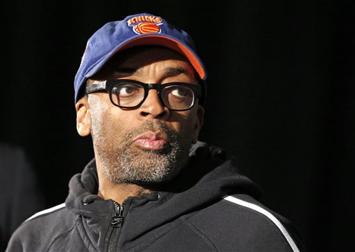 This April 29, 2014 file photo shows filmmaker and avid basketball fan Spike Lee at a news conference by NBA Commissioner Adam Silver in New York announcing that Los Angeles Clippers owner Donald Sterling has been banned for life by the league. Lee says his wife convinced him to turn his 1986 film "She's Gotta Have It" into a television series for Showtime. The original story focused on a woman's relationship with three men, exploring the issues of race, sexuality and gentrification in the neighborhood of Brooklyn. Showtime will decide whether the show gets picked up or not. (AP Photo/Kathy Willens, FIle)