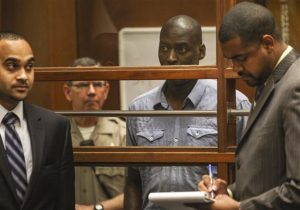Actor Michael Jace appears in court in Los Angeles Thursday, May. 22, 2014.  A judge has delayed the arraignment of  Jace on a murder charge filed over his wife's shooting death earlier this week. Attorneys for Jace, who played a police officer in the hit TV series "The Shield," sought a continuance during the actor's first court appearance in Los Angeles on Thursday. He's due back in court June 18. The 51-year-old was charged Thursday with a single count of murder and he is accused of shooting his wife April multiple times in their home Monday evening. (AP Photo/David McNew, Pool)