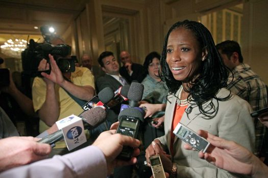 Republican Mia Love candidate for Utah's 4th Congressional District responds to questions from the media following the annual conference of the Utah Taxpayers Association Tuesday, May 20, 2014, in Salt Lake City. In their first appearance together, Republican Love and Democrat Doug Owens fielded questions from a Utah taxpayer watchdog group. (Rick Bowmer/AP Photo)