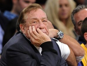 In this Feb. 25, 2011, file photo, Los Angeles Clippers owner Donald Sterling looks on during the first half of their NBA basketball game against the Los Angeles Lakers in Los Angeles. Sterling could use lawyers and lawsuits to challenge the NBAs plan to force him out over recent racist comments, but legal experts say the league would likely prevail in the end.  (AP Photo/Mark J. Terrill, File)
