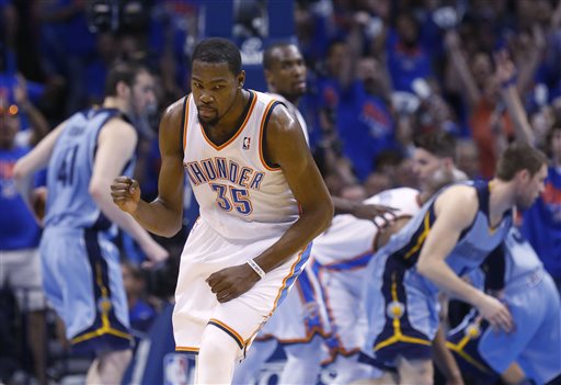 Oklahoma City Thunder forward Kevin Durant (35) pumps his fist as he heads back up the court following a three-pointer in the second quarter of Game 7 of an opening-round NBA basketball playoff series against the Memphis Grizzlies in Oklahoma City, Saturday, May 3, 2014. (AP Photo/Sue Ogrocki)