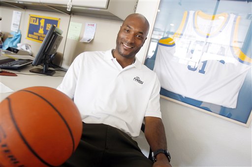 In this photo taken Saturday, Sept. 18, 2010, former UCLA basketball player Ed O'Bannon Jr. sits in his office in Henderson, Nev. O'Bannon is part of a lawsuit seeking revenue sharing for NCAA athletes. "There are millions and millions of dollars being made off the sweat and grind of the student athlete," O'Bannon said. "Student athletes see none of that other than their education." (AP Photo/Isaac Brekken)