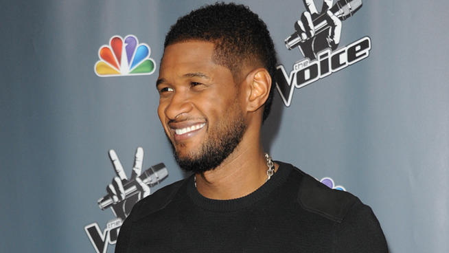 Usher arrives at the 4th season premiere screening of "The Voice" at the TCL Theatre on Wednesday, March 20, 2013 in Los Angeles. (Richard Shotwell/Invision/AP)
