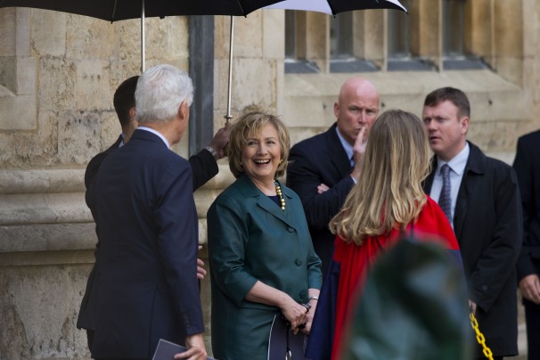 Hillary Rodham Clinton, center, laughs with her husband, former U.S. President Bill Clinton, at their daughter Chelsea's Oxford University graduation ceremony on Saturday. (Matt Dunham/AP)
