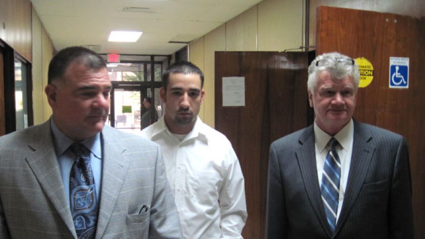 Oct. 22, 2010: Former Winnfield Police Officer Scott Nugent, center, walks with his attorneys Phillip Terrell, left and George Higgins in the Winn Parish Courthouse in Winnfield, La. (AP Photo)