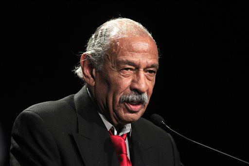 In this Nov. 6, 2012 photo, Rep. John Conyers, D-Mich., addresses supporters during the Michigan Democratic election night party in Detroit. Wayne County Clerk Cathy Garrett is expected to make her final determination Tuesday, May 13, 2014 on whether the longtime congressman should be on the Aug. 5 primary ballot. (AP Photo/Carlos Osorio)