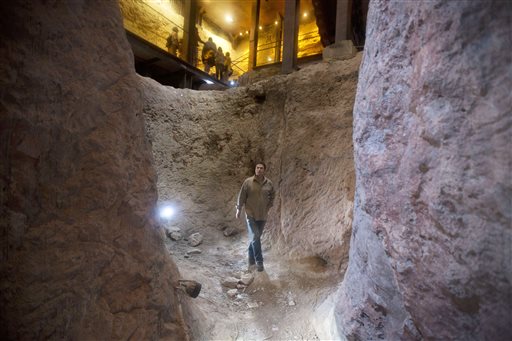 In this Thursday, May 1, 2014, photo, Eli Shukron, an archeologist formerly with Israel's Antiquities Authority, walks in the City of David archaeological site near Jerusalem's Old City. Shukron, who excavated at the site for nearly two decades, says he believes there is strong evidence that it is the legendary citadel captured by King David in his conquest of Jerusalem, rekindling a longstanding academic and political debate about using the Bible as a field guide to identifying ancient ruins. (AP Photo/Sebastian Scheiner)