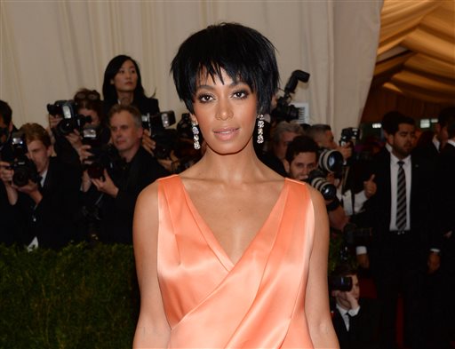 This May 5, 2014 file photo shows Solange Knowles, sister of Beyonce Knowles, at The Metropolitan Museum of Art's Costume Institute benefit gala celebrating "Charles James: Beyond Fashion" in New York. Beyonce, Jay Z and Solange say they have worked through and are moving on since a video leaked this week of Solange attacking Jay Z in an elevator inside the Standard Hotel after the May 5, gala. (Photo by Evan Agostini/Invision/AP)