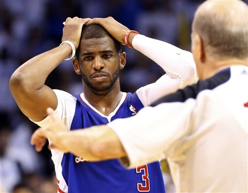 Los Angeles Clippers guard Chris Paul reacts after being called for a foul on Oklahoma City Thunder guard Russell Westbrook in the final seconds of the fourth quarter of Game 5 of the Western Conference semifinal NBA basketball playoff series in Oklahoma City, Tuesday, May 13, 2014. Oklahoma City won 105-104. (AP Photo)