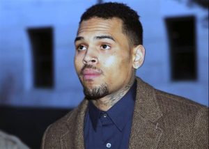 In this Feb. 3, 2014, file photo, R&B singer Chris Brown arrives at Los Angeles Superior Court for a probation review hearing in Los Angeles. Brown was released early Monday, June 2, 2014, from a Los Angeles County jail, authorities said. Brown had been in custody since mid-March, when he was arrested after being expelled from a court-ordered rehab sentence for violating its rules. (AP Photo/Nick Ut, File)
