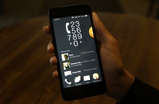 The phone app is demonstrated in carousel mode on the new Amazon Fire Phone, Wednesday, June 18, 2014, in Seattle. (AP Photo/Ted S. Warren)