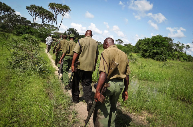 Kenyan security officers searched Tuesday for those who killed dozens in coastal communities. (Associated Press)