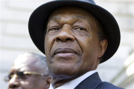 In this July 6, 2009 file photo, former District of Columbia Mayor Marion Barry attends a news conference on the steps of Washington's city hall. Barry was famously caught on videotape smoking crack cocaine in 1990 in an FBI sting. After six months in prison, he was released and won a seat on the city council. He was re-elected to a fourth term as mayor in 1994.  (AP Photo/Manuel Balce Ceneta, File)
