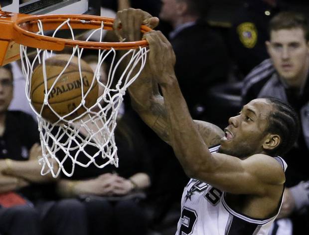 San Antonio Spurs Kawhi Leonard wins 2014 NBA Finals MVP. (AP Photo/Tony Gutierrez)