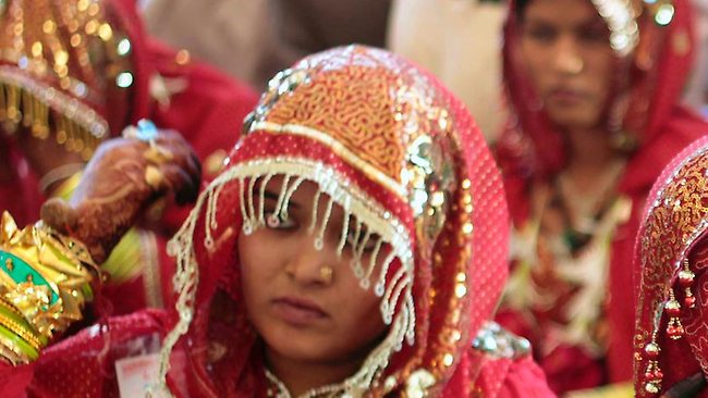 Indian women are often scape-goated by groom's families unhappy with the dowries they receive. (Ajit Solanki/AP)
