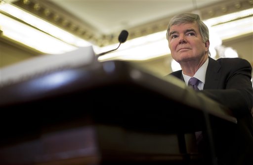 National Collegiate Athletic Association (NCAA) President Mark Emmert prepares testify on Capitol Hill in Washington, Wednesday, July 9, 2014, before the Senate Commerce hearing on the NCAA's treatment of athletes. (AP Photo/Pablo Martinez Monsivais)