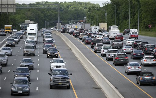 In this May 23, 2014 file photo, traffic moves on the Interstate 495, the Capital Beltway, in Hyattsville, Md., outside Washington. The Centers for Disease Control and Prevention released its latest drowsy driving report on Thursday, July 3, 2014. According to a new survey, about 1 in 25 adults say they recently fell asleep while driving. (AP Photo/Carolyn Kaster, File)