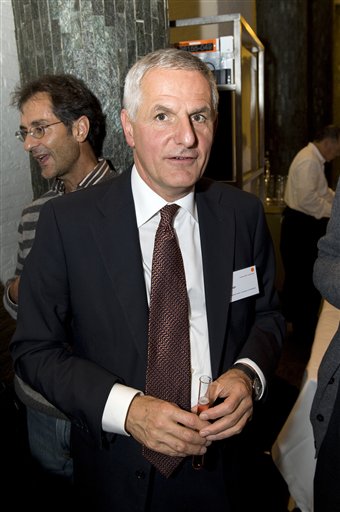 In this June 2009 photo provided by AMC Amsterdam on Friday, July 18, 2014, former president of the International AIDS Society Joep Lange is seen. A large number of world-renowned AIDS researchers and activists heading to an international AIDS conference in Australia were on board a Malaysian jetliner that was shot down over Ukraine, officials said Friday, as news of their deaths sparked an outpouring of grief across the global scientific community.  Among them was Joep Lange, a well-known researcher from the Netherlands (AP Photo/Peter Lowie/AMC)