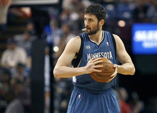 In this April 13, 2014, file photo, Minnesota Timberwolves forward Kevin Love gets ready to play the Sacramento Kings in Sacramento, Calif.  A person with knowledge of the situation tells The Associated Press that the Timberwolves and Golden State Warriors have restarted trade talks for All-Star forward Kevin Love.  (AP Photo/Steve Yeater, File)