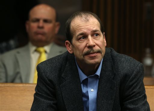In this April 25, 2014, file photo, Theodore Wafer listens during a motion hearing in Judge Timothy Kenny's courtroom at the Frank Murphy Hall of Justice in Detroit. Jury selection starts Monday, July 21, 2014, in a trial that will put Wafer's self-defense claim to a tough test. The 19-year-old woman, Renisha McBride, was drunk but unarmed when she climbed the steps of his Dearborn Heights porch, 3 ½ hours after crashing her car a few blocks away. Roused from sleep by the sound of pounding in the wee hours, he grabbed his shotgun, opened the front door and blasted her in the face. (AP Photo/Detroit Free Press, Eric Seals, File) 