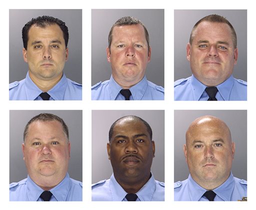 This undated photo combination provided by the Philadelphia Police Department shows from top left to right, Philadelphia Police officers Thomas Liciardello, Brian Reynolds, Michael Spicer, and from bottom left to right, Perry Betts, Linwood Norman and John Speiser. The six city narcotics officers were arrested Wednesday, July 30, 2014 and the charges in the 26-count indictment include racketeering conspiracy, extortion, robbery, kidnapping and drug dealing. (AP Photo/Philadelphia Police Department)