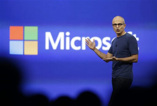 In this April 2, 2014 file photo, Microsoft CEO Satya Nadella gestures during the keynote address of the Build Conference in San Francisco. Microsoft on Thursday, July 17, 2014 announced it will lay off up to 18,000 workers over the next year. (AP Photo/Eric Risberg, File)
